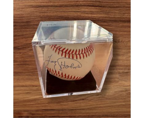 Larry Holmes Signed Baseball with Display case, has JSA Certification Number AJ68333. Holmes's left jab is often rated among 