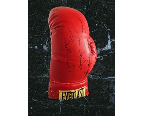 Michael Spinks and Leon Spinks signed red Everlast boxing glove. Michael Spinks (born July 13, 1956)[a] is an American former