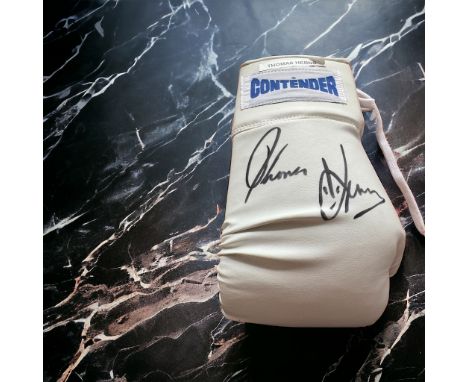 Thomas Hearns signed white Contender boxing glove. Thomas Hearns (born October 18, 1958) is an American former professional b