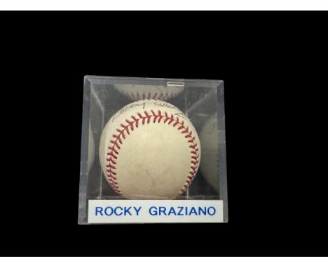 Rocky Graziano signed baseball in display case., was an American professional boxer and actor who held the World Middleweight