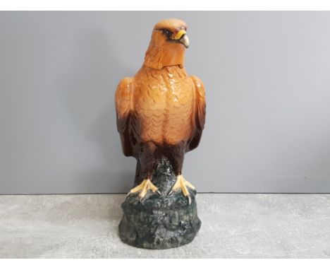 Royal Doulton Whyte &amp; Mackay scotch whisky golden eagle decanter, modelled by John.G.Tongue 1984, height 27cm