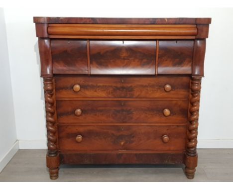 A Victorian flame mahogany scotch chest of drawers with barley twist pilasters 130 x 135.5 x 63cm