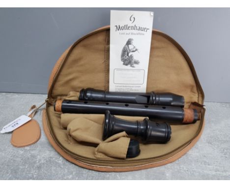 A Mollenhauer three piece treble recorder in fitted bag.