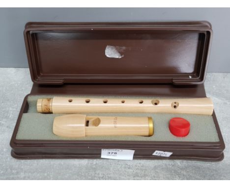 A Moeck two piece barock recorder in fitted case.