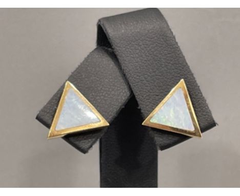 Ladies 9ct gold triangle shaped Opal stud earrings.