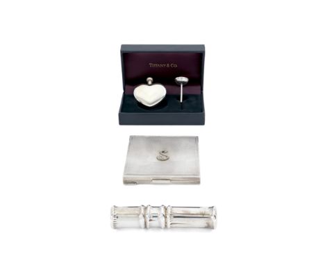 A group of silver including items by Tiffany & Co.The group comprising: a heart-shaped silver scent bottle with funnel, by Ti