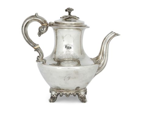 Of historical interest. A William IV silver coffee potA. B. Savory & Sons London, 1834Raised on four shell bracket feet, the 