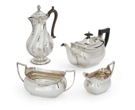 A George V silver three piece tea setBarker BrothersBirmingham, 1931Of plain, oval form with reeded banding to upper bodies, 