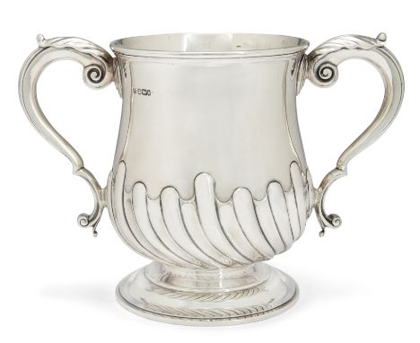 A late Victorian twin-handled silver cup William Hutton & SonsSheffield, 1900The half-lobed body to foliate capped scroll han