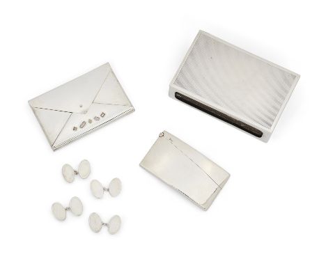 A novelty silver card case designed as an envelopeMappin & WebbBirmingham, 2000In retailer's box, 6.1 x 9.3cm, together with 