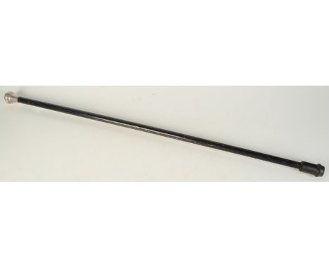 An ebony walking cane with plain silver finial. 