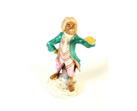 A continental figure of an animal in gentleman's clothing, blue crossed sword mark to base, height 13cm.    Condition report: