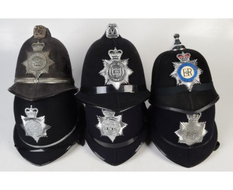Six constable police helmets, Devon and Cornwall, Thames Valley, Metropolitan, South Wales, Humberside and South Yorkshire.