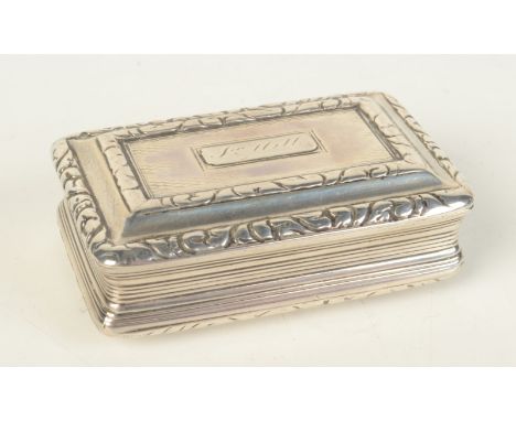 A George III silver snuff box with engine turning, reeded body and cast chased borders, Birmingham 1797, width 5.7cm, 1.7oz.