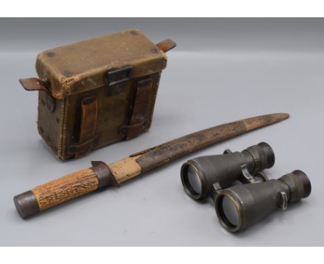 A pair of German Leitz Wetzler military binoculars, in original leather case, height 11.3cm, width 11.2cm and a horn handled 