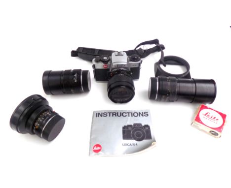 A Leica R4 camera with Leitz lens and four other Leitz lenses.   Condition report:  1:2.8 / 135 LEITZ CANADA 3106093 ELMARIT 