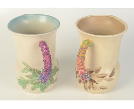 A Clarice Cliff 'My Garden' series jug, No.677, height 19cm and a similar Clarice Cliff Newport Pottery jug, No.677, height 1