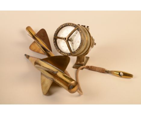 A brass Walker's Trident electric ship-log Mark III and two brass accessories each inscribed 'T.W. Excelsior'.