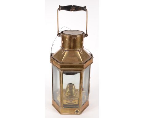 A brass ships lamp, impressed Bulpitt, early 20th century, with a central glazed door, height 41cm, width 21.5cm, depth 13cm.