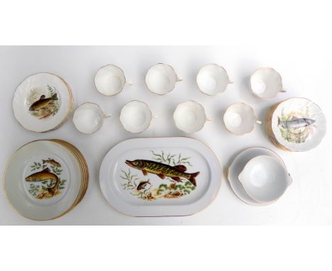 A JKW western Germany porcelain part dinner service, decorated with fish, comprising six plates, a platter and a bowl, and a 