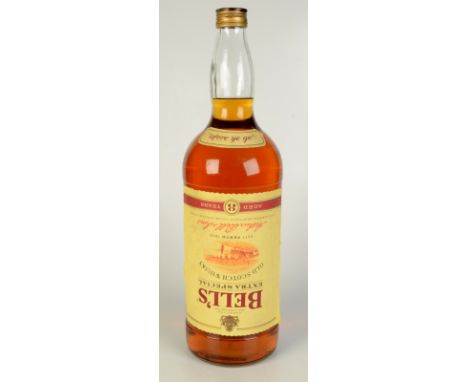A large bottle of Bell's Extra Special Old Scotch Whisky, aged 8 years, 4.5 litres, boxed, height 51cm.   Condition report:  