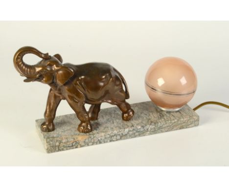 A French Art Deco elephant mounted table lamp, with globular shade on a marble plinth, height 20cm, length 35cm.  Condition r