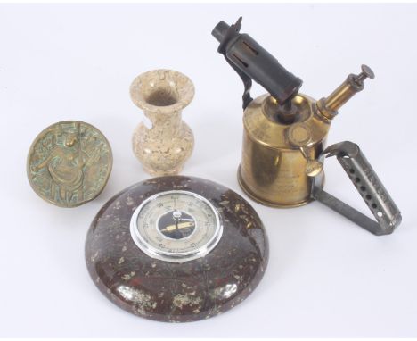 A Cornish serpentine circular barometer, diameter 17.5cm, a small serpentine vase, a brass pin tray and a Sievert brass blow 