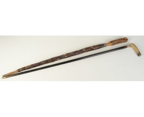 A cabbage stalk walking cane, shaped to simulate a furled umbrella with a band of glass beads, together with a walking stick 