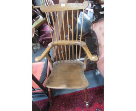 A Peter Marshall comb back Windsor armchair, circa 1960, pupil of Robin Nance, St Ives, height 111cm, width 64cm. 