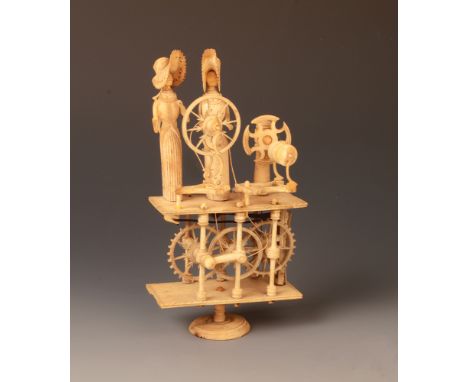 A Napoleonic French prisoner of war carved bone spinning Jenny automaton, early 19th century, the two figures standing behind