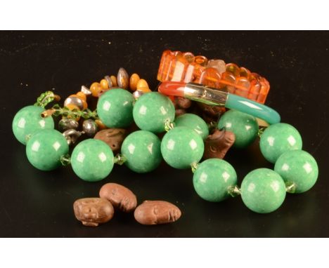 A jade and agate bangle etc.