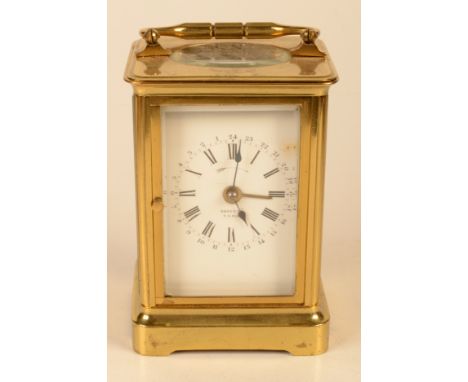 A French alarm carriage clock with brass case.