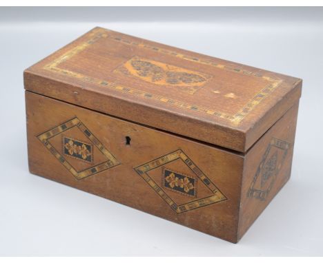 A Victorian mahogany Tunbridge Ware box, the cover decorated with a moth, opening to reveal eight square sections, each with 
