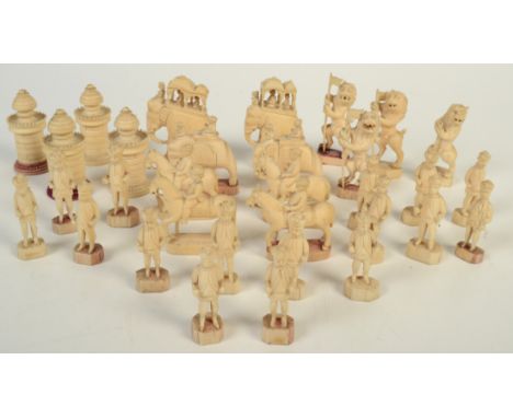 An Indian ivory chess set, 19th century, comprising of sixteen pawns modelled as mughal guards, height 5.2cm, four knights as