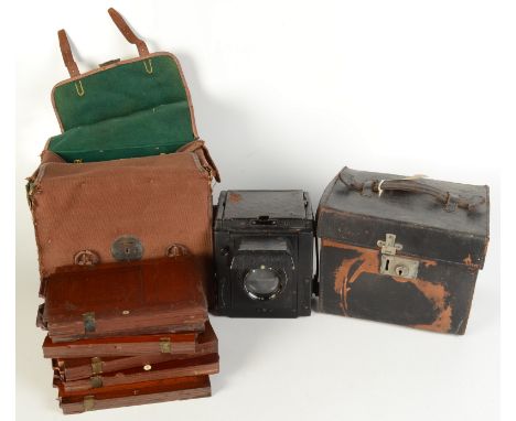 An 'Ensign-Special' Reflex camera by The Houghton-Butcher MFG. Co. Ltd. London in a black leather case and a brown canvas cas