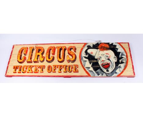 A painted wooden 'Circus Ticket Office' sign, height 43.5cm, width 142cm.  Condition report: This is a repro.
