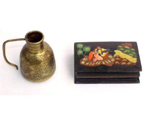 A Persian black lacquered snuff box, early 20th century, height 3cm, width 11cm, depth 7cm and a brass Cairoware jug with Ara