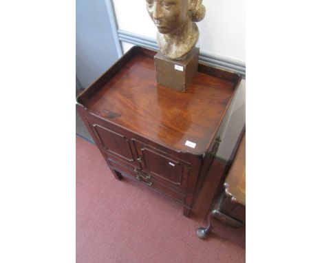 A George III mahogany tray top commode, with a pair of panelled doors above two long drawers on square section legs, height 8