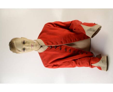 A late Victorian or Edwardian red army jacket with ten buttons of the South Devon Militia.