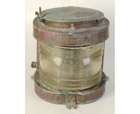 A copper ship's lamp inscribed 'TRAWLING', with a glazed front, height 33cm, width 30cm.