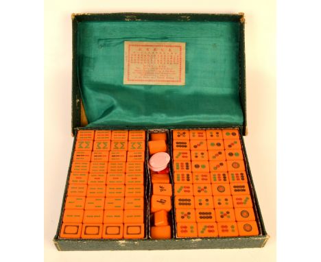 A Chinese mahjong set, with original paper label beneath the cover inscribed 'WING LEE MA JONG MANUFACTURERS, Noo. 521. Canto