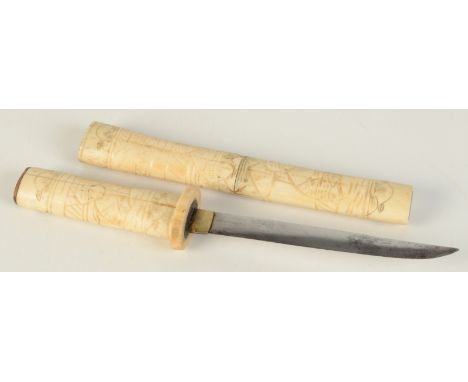 A Japanese dagger with bone handle and scabbard, late 19th/early 20th century, length 29.7cm.