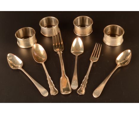 A set of four numbered engine turned silver napkin rings and a little silver cutlery, 6.4oz.