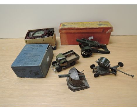 A Britains diecast, 18' Howitzer mounted for field service, in original box pat no 617492 along with three unnamed diecast Mi