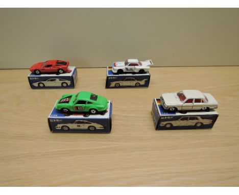 Four Tomy Tomica made in Japan diecasts, German and Italian Cars, F7 Mercedes Benz 450 SEL, F17 Porsche 911S Racing Type, F30