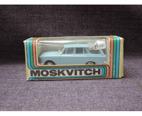 A Moskvitch 1:43 scale diecast, Saloon Car in light blue with white interior, in original window box