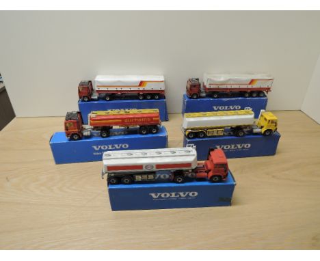 Five 1980's Siku diecast, Volvo F10 Transporter with Awnings x2, Volvo F7 Fuel Tankers x2, Esso and unnamed and Volvo F10 Tan