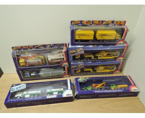 Seven 1980's Siku diecasts, 3712 Petrol Station Tanker Aral, 3714 Post Office Postal Service, 3715 Lorry with Foot Bridge, 37