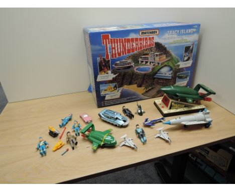 A Matchbox TB710 Thunderbirds Tracy Island Electronic Play Set in original box along with figures and accessories, Wesco Thun