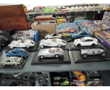 Ten 1:18 and similar scale diecasts, Burago Mercedes Benz 300 SLR MM 1955 boxed, Maisto Mercedes Benz 500 K Typ Special Roads